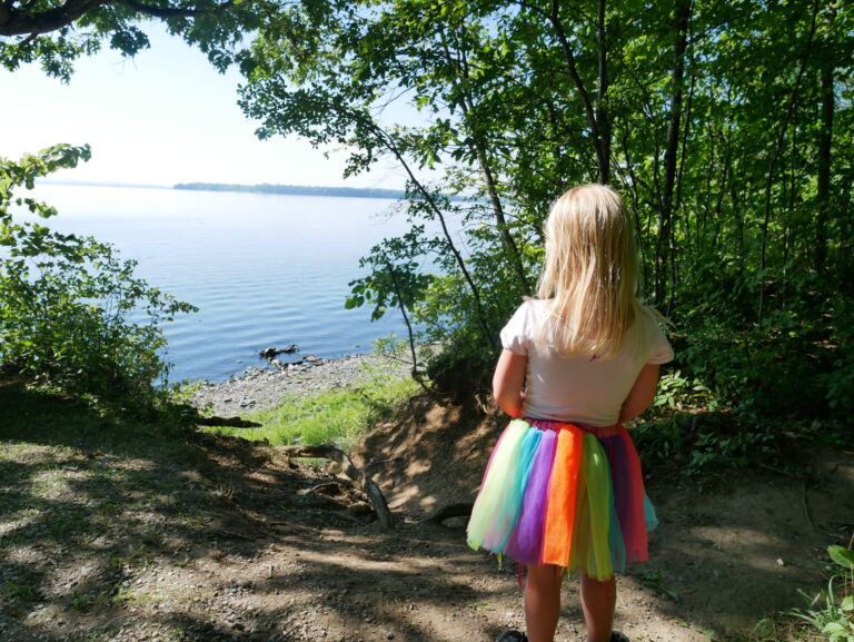 Grand Isle State Park girl in tutu looking at lake