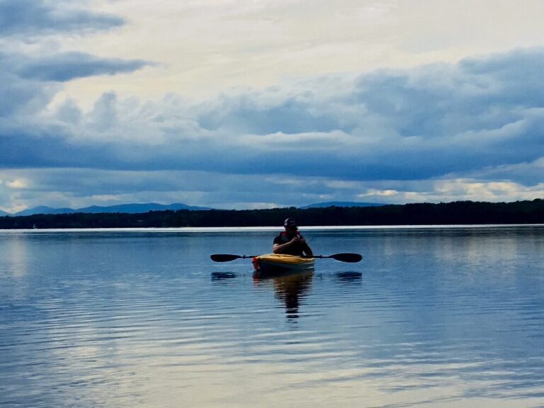 person kayaking in vermont