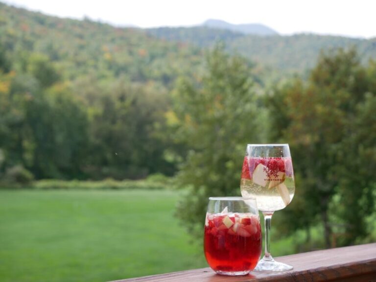 wine cocktails on a deck overlooking fall in vermont mountain scene